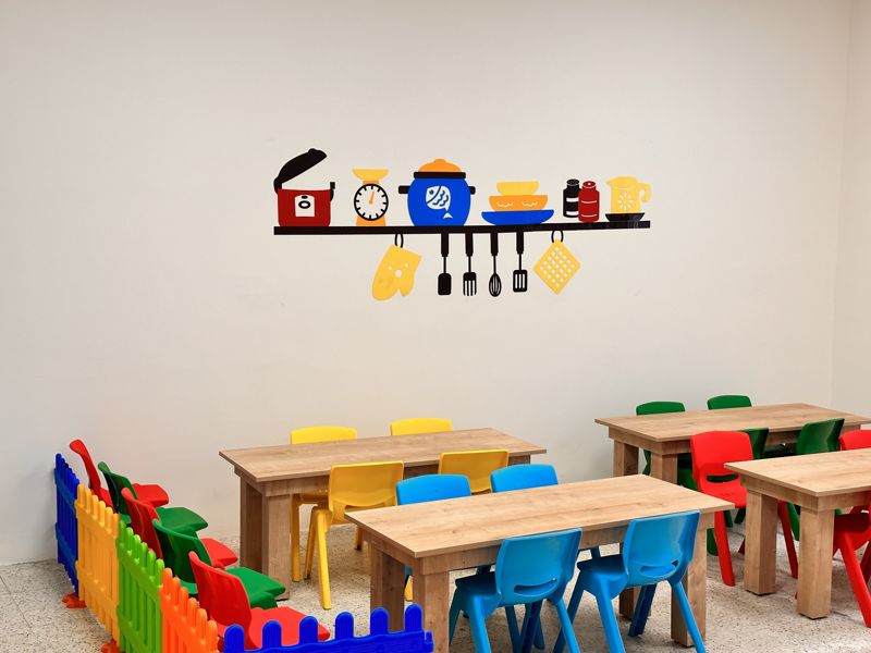 Dining room with colourful tables and chairs
