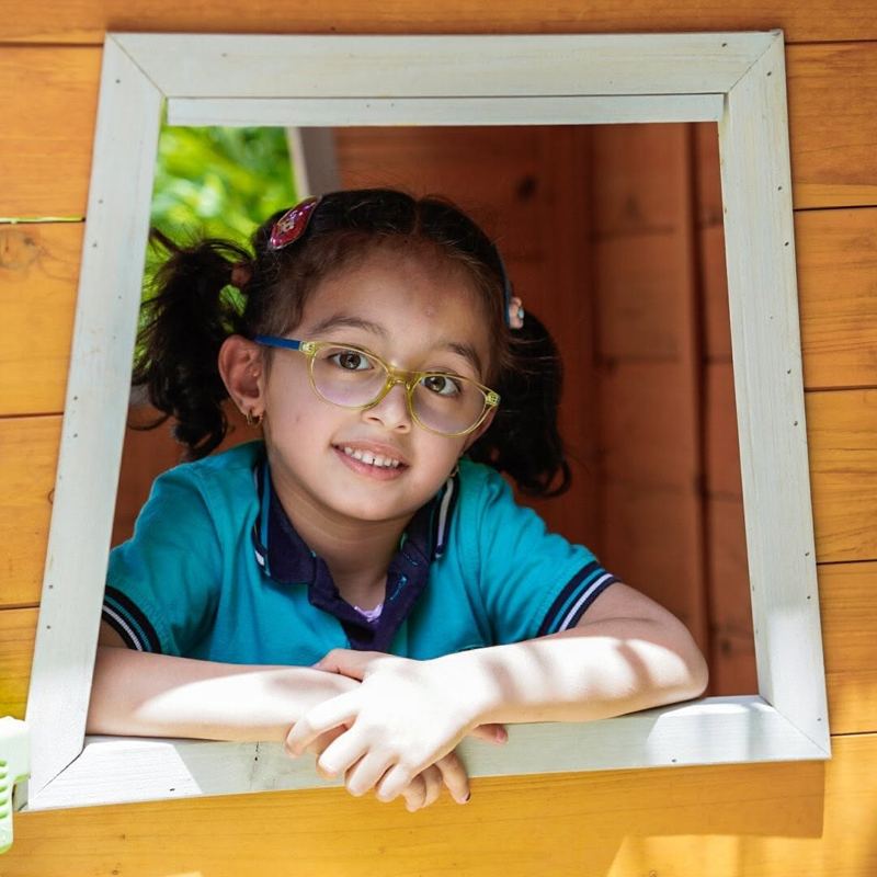 At the playhouse window